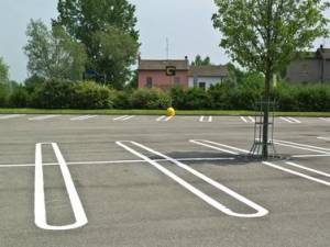 Area destinata a parcheggio. Le Sezioni Unite risolvono il problema del litisconsorzio necessario.