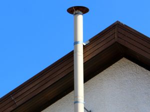 Installazione di canna fumaria in condominio: necessarie informazioni dettagliate per l'approvazione assembleare