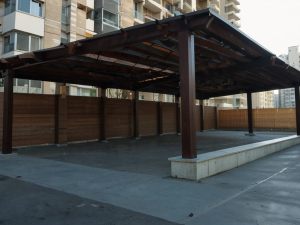 Realizzazione di tettoie e pergolati in condominio: quale titolo edilizio serve?
