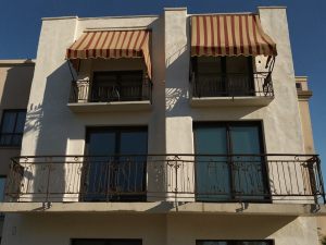 Decoro architettonico e installazione di tende da sole: i criteri da seguire